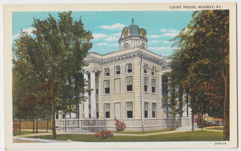 Fourth and present Calloway County Courthouse in Murray, Kentucky built in 1913.  The Falls Construction Company of Louisville built the courthouse at a cost of $49,679 and was finished in just 200 days.  Listed on the National Register of Historic Places in 1986.  Anyone know what is missing from this post card?
